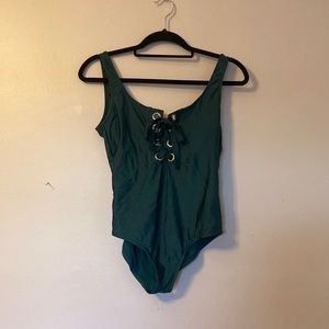Green one piece womans bathing suit